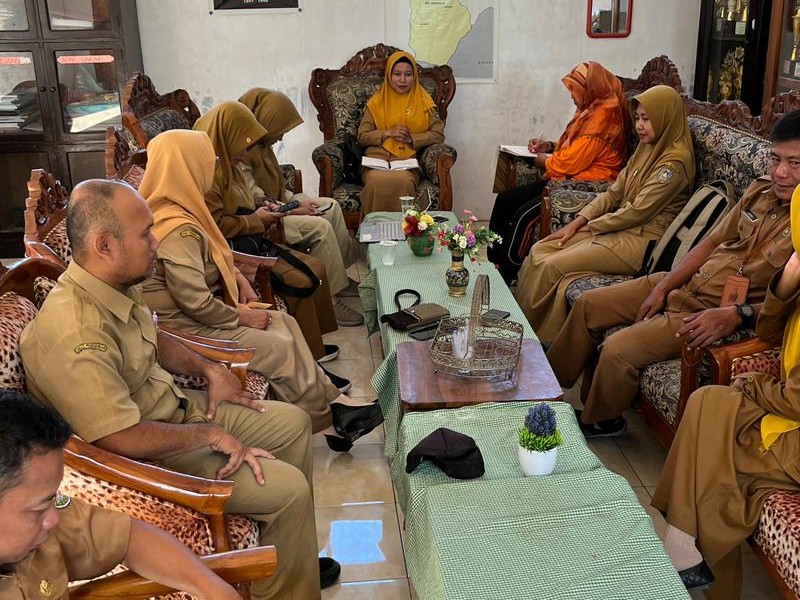 RAPAT GURU